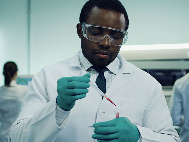 Doctor working with blood sample